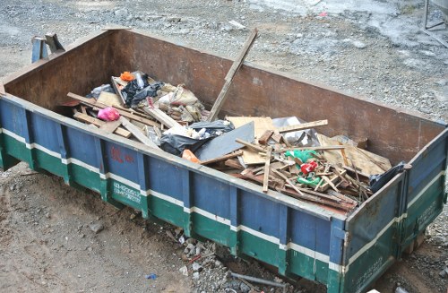 Clearing garden debris with specialized equipment